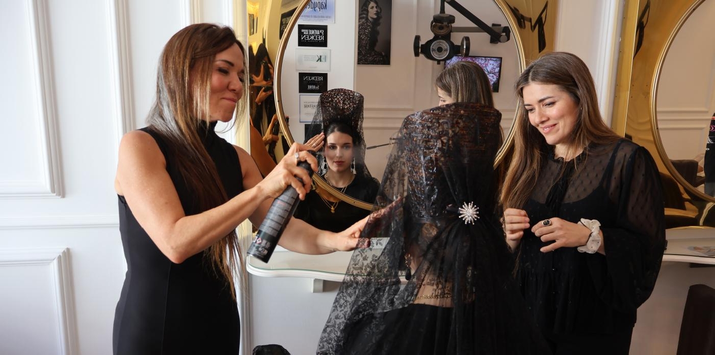 The woman in mantilla as a symbol of respect, mourning and tradition
