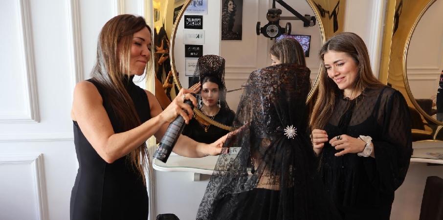 The woman in mantilla as a symbol of respect, mourning and tradition